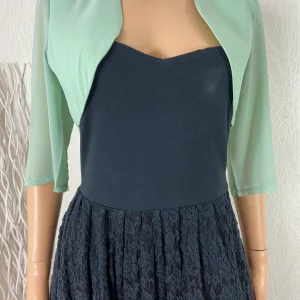 Boléro vert pâle manches courtes transparentes Charm’s
