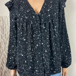 Blouse noire ample fluide mmanches longues motifs étoiles argentéées Deeluxe