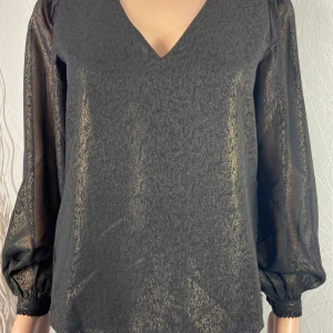 Blouse doublée noire et dorée manches longues bouffantes Deeluxe