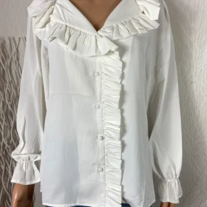 Chemisier blanc à volants manches longues Unika