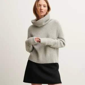 Pull col roulé boutonné