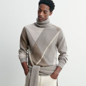 Pull col roulé argyle